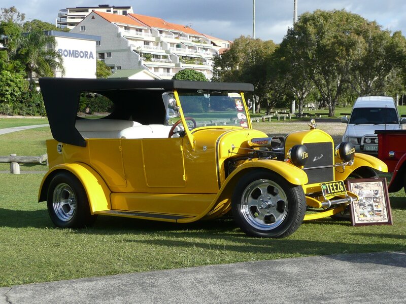 Yellow Vintage Car — Calm, Afternoon, Photograph, Building, Trees