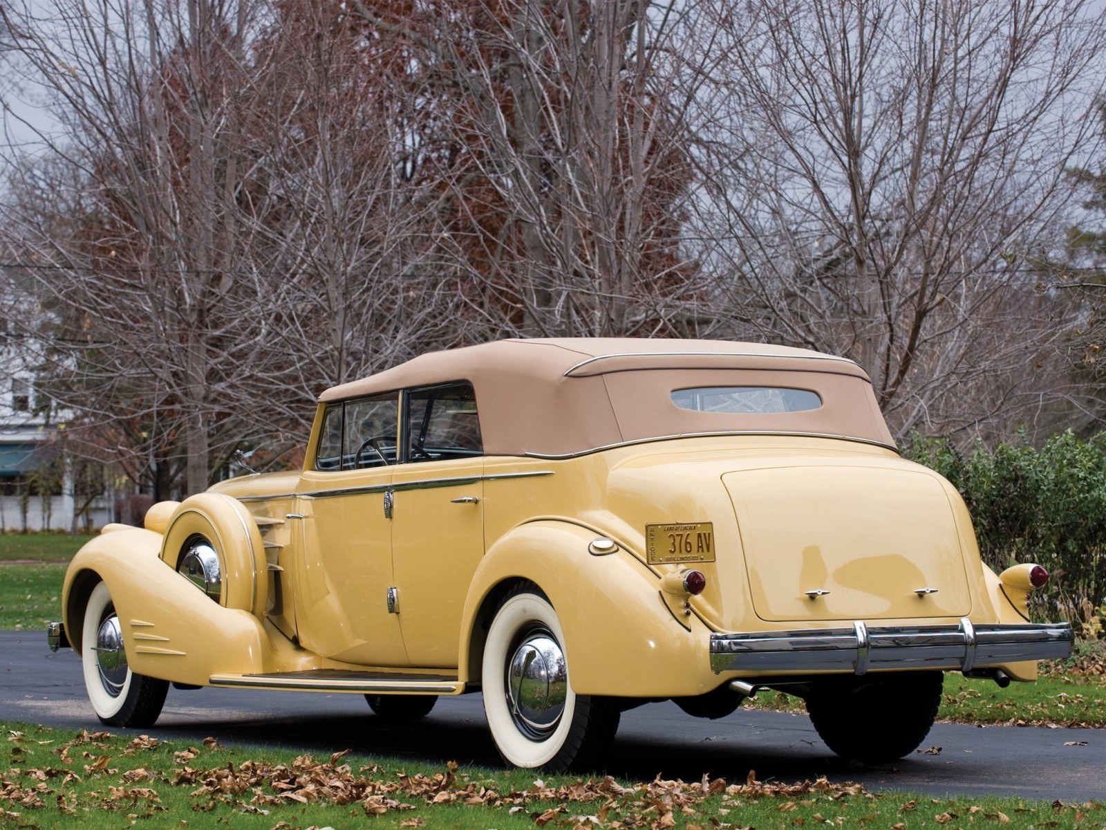 yellow vintage convertible car