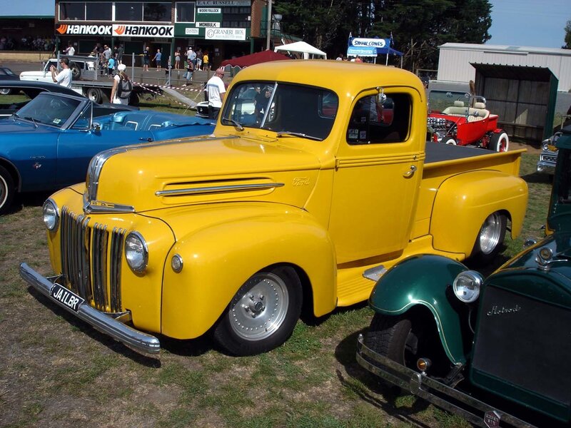 Yellow vintage Ford pickup truck