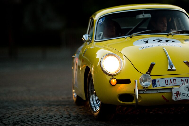 Yellow vintage race car at night