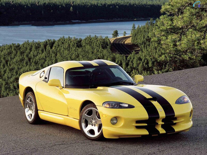 Yellow Viper sports car on a scenic road