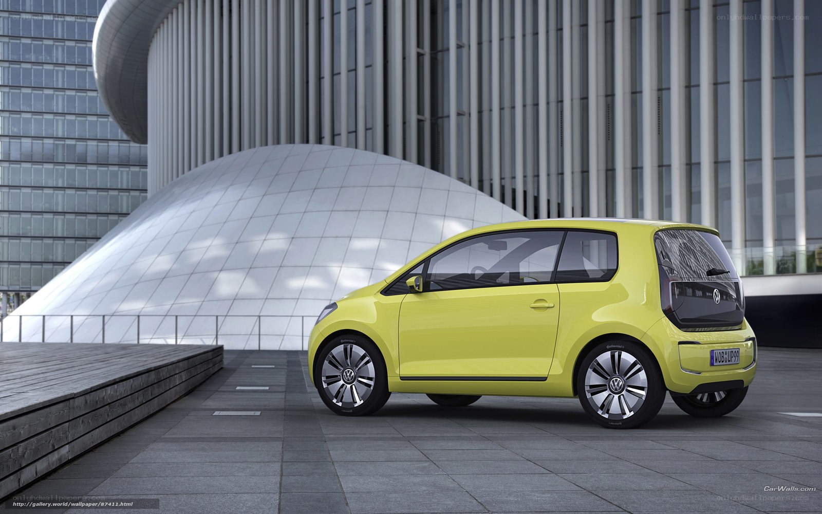 Yellow Volkswagen car in city