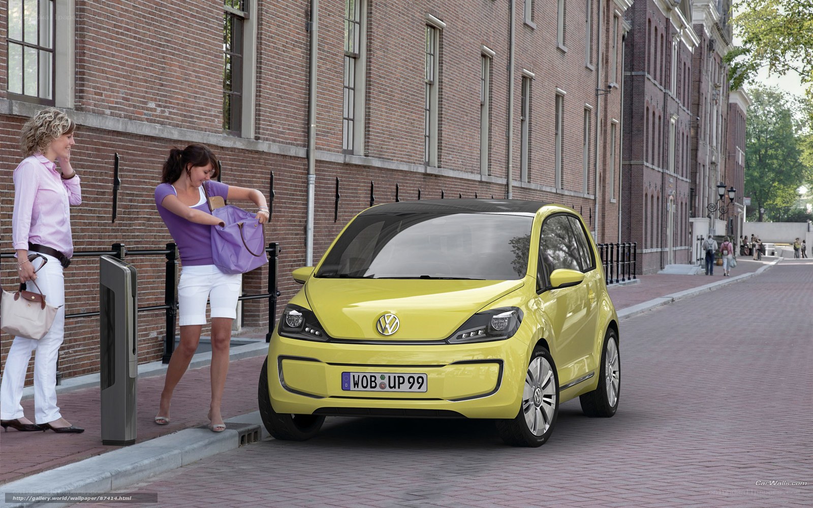 Yellow Volkswagen car on street