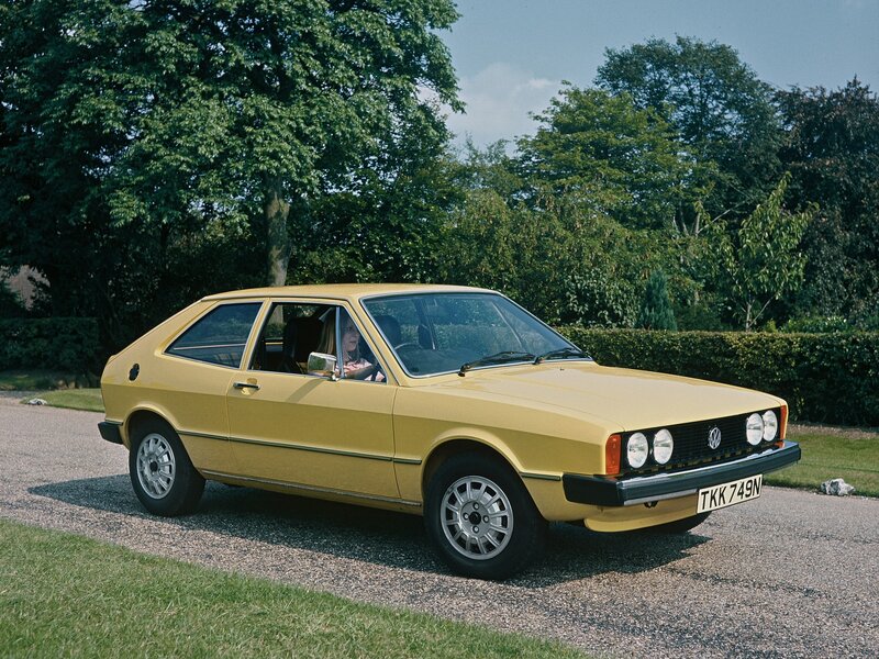 Yellow Volkswagen Golf parked outdoors