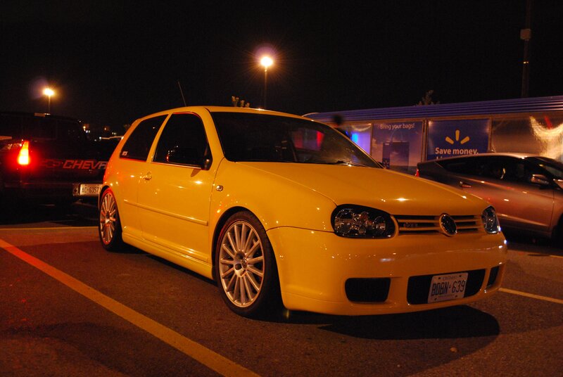 Yellow Volkswagen in parking lot