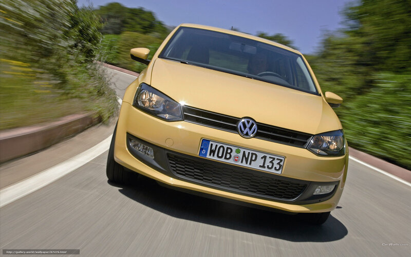 yellow volkswagen on road