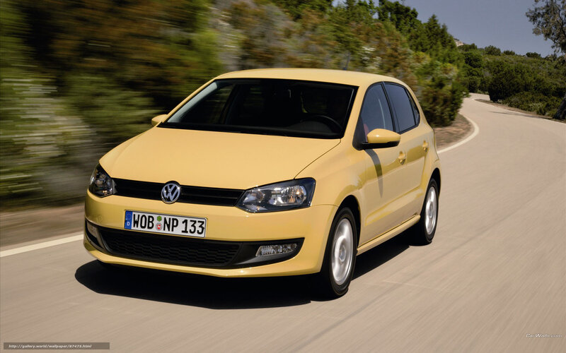 yellow volkswagen polo driving