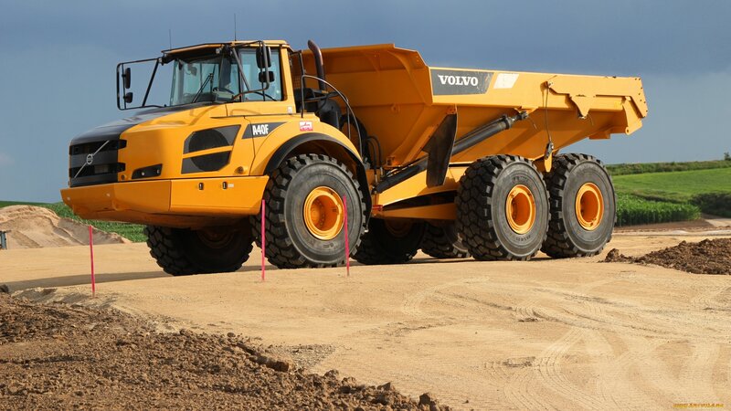 Yellow Volvo Dump Truck — Industrial