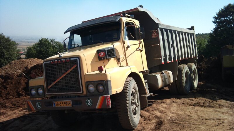 Yellow Volvo Dump Truck — Outdoor