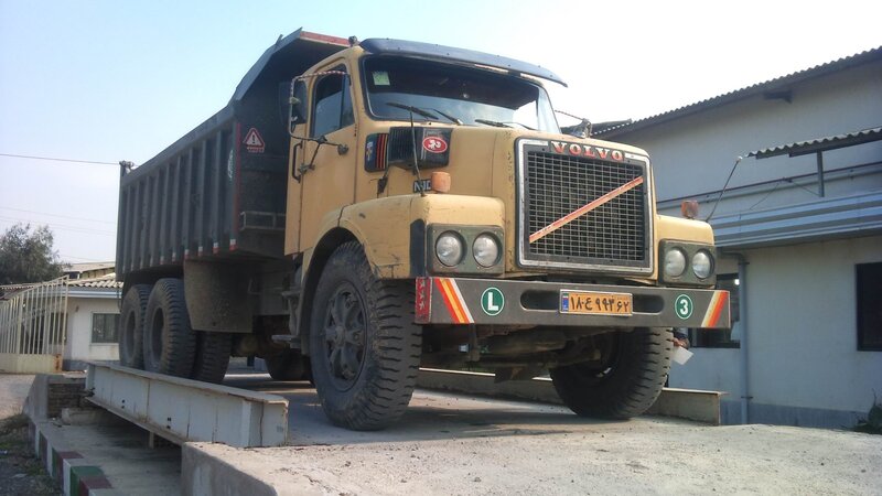 Yellow Volvo Dump Truck