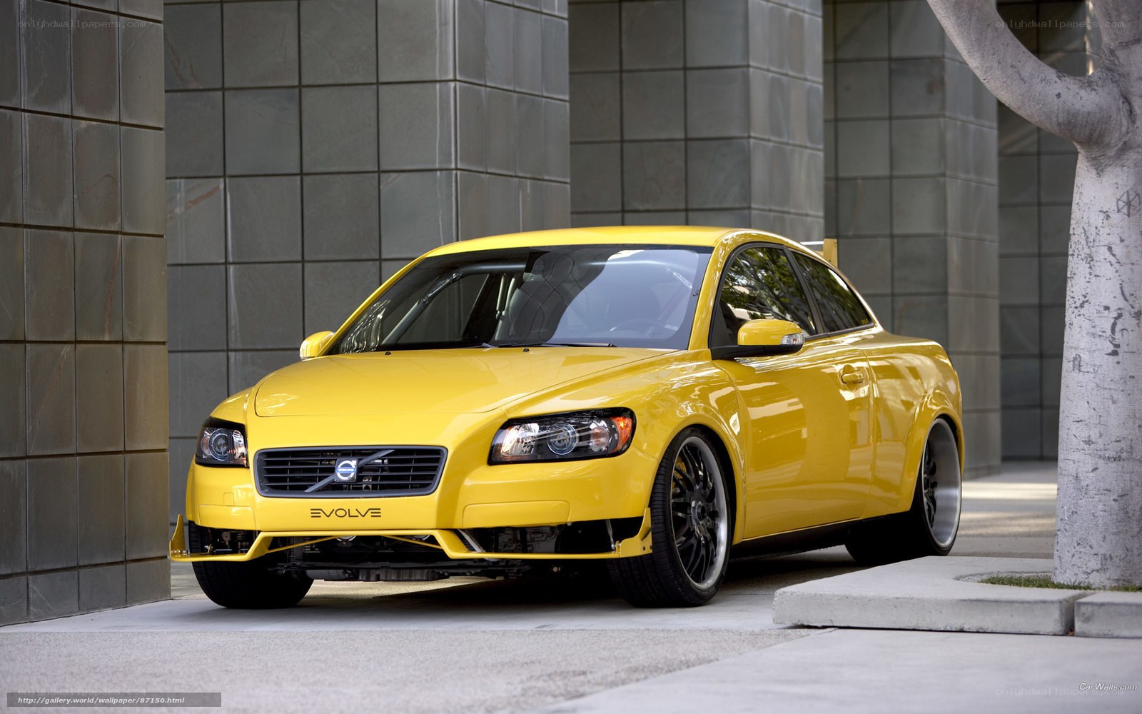 yellow volvo evolve car