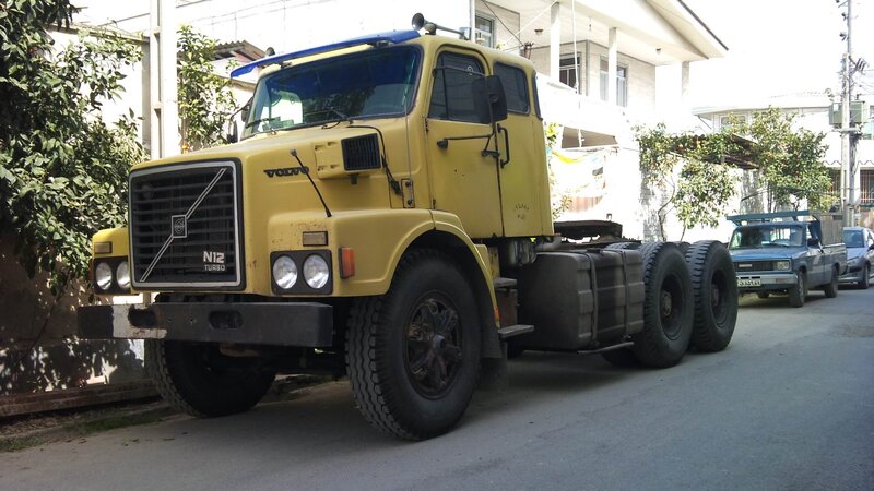 Yellow Volvo N12 Truck
