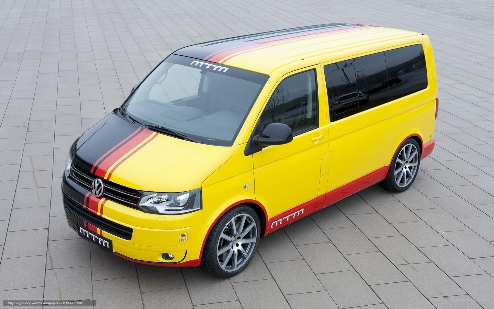 Yellow VW T5 van with MTM decals