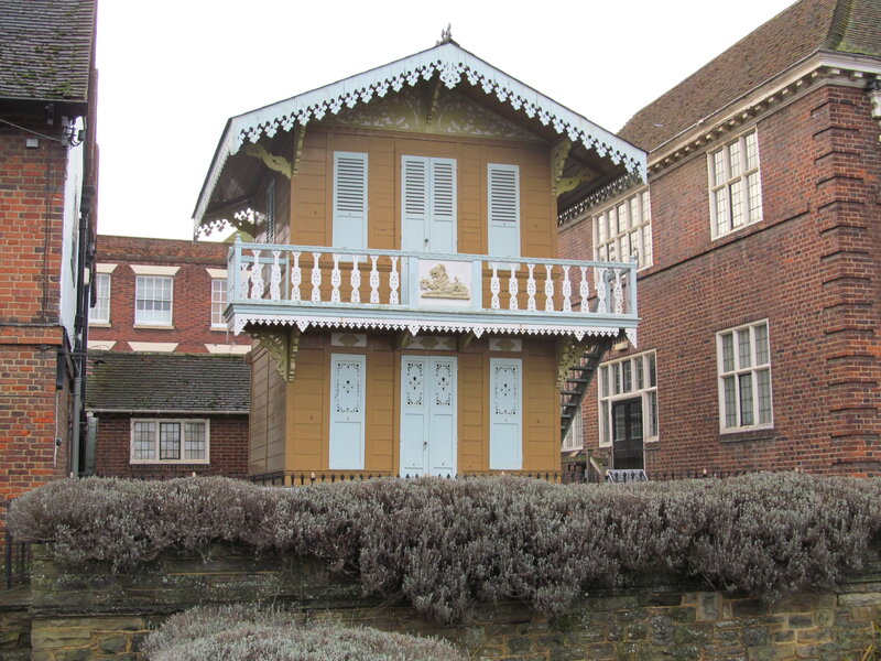 Yellow Wooden Building — Brown