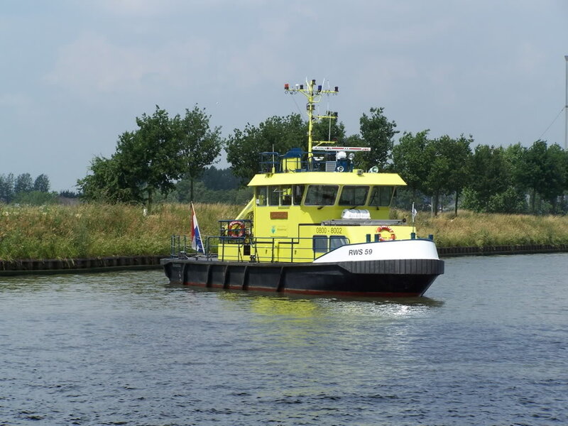 Yellow Workboat on Canal