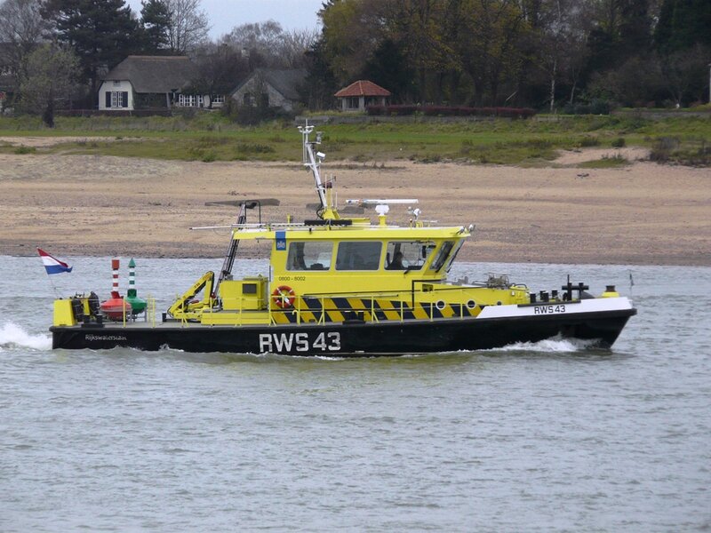 Yellow Workboat on Water