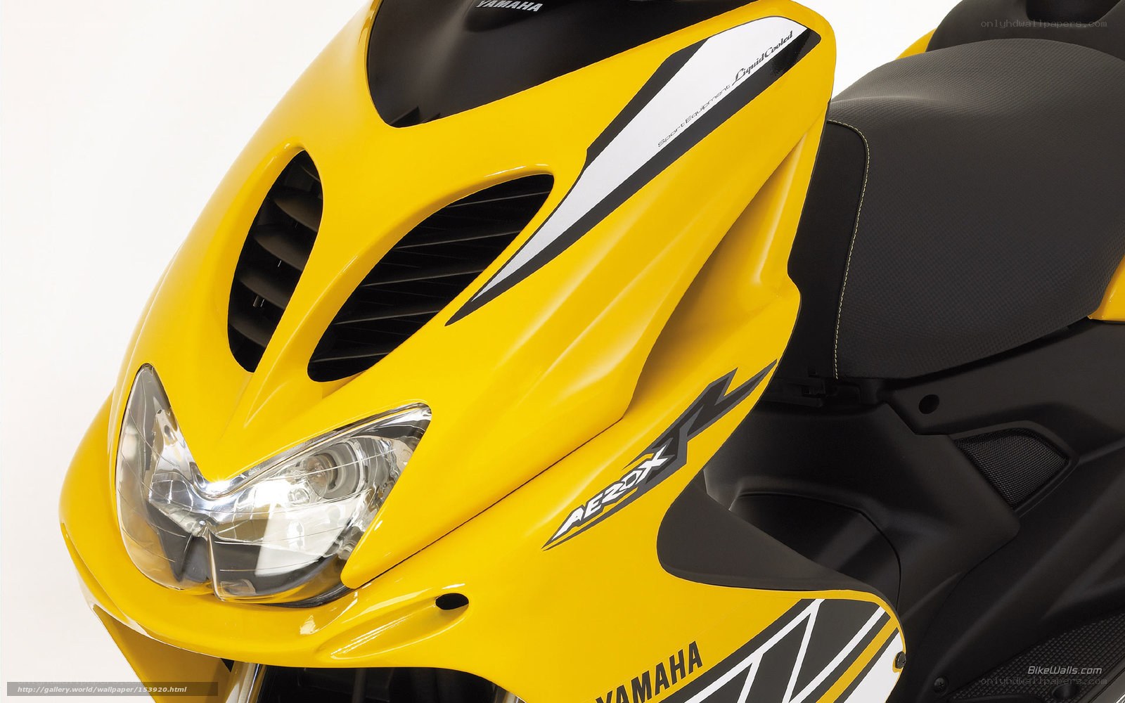 Yellow Yamaha scooter front view