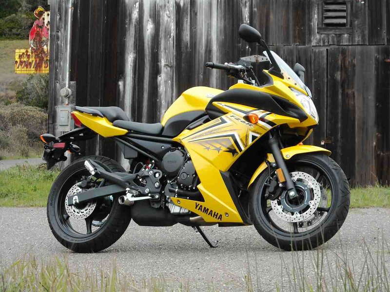 yellow Yamaha sport motorcycle