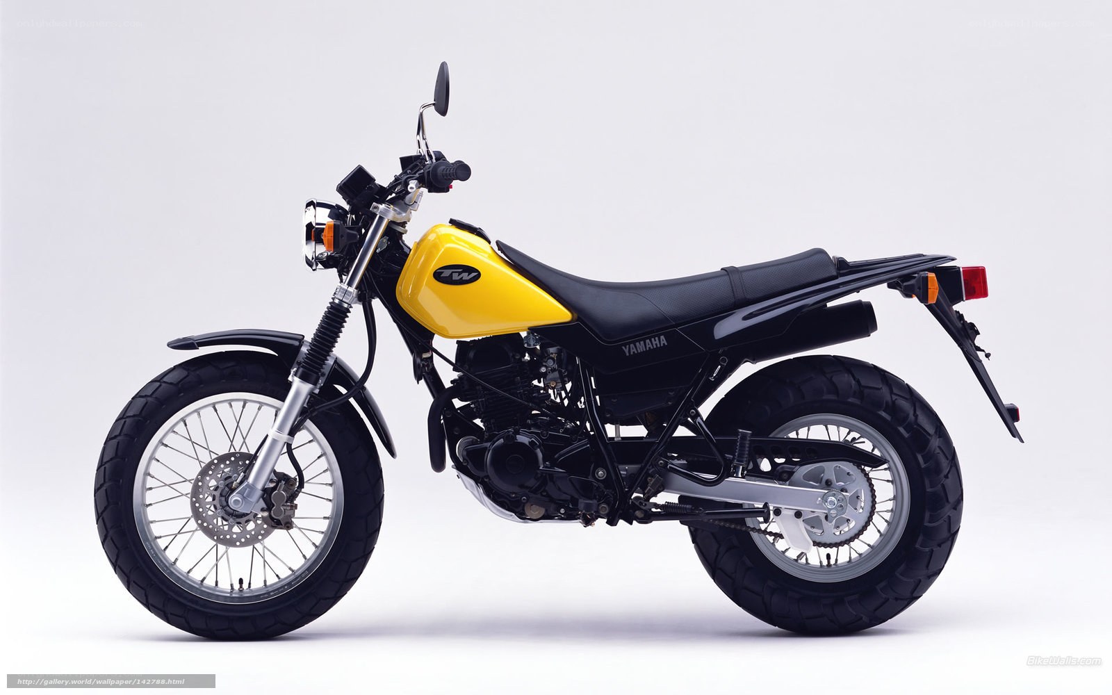 Yellow Yamaha TW motorcycle