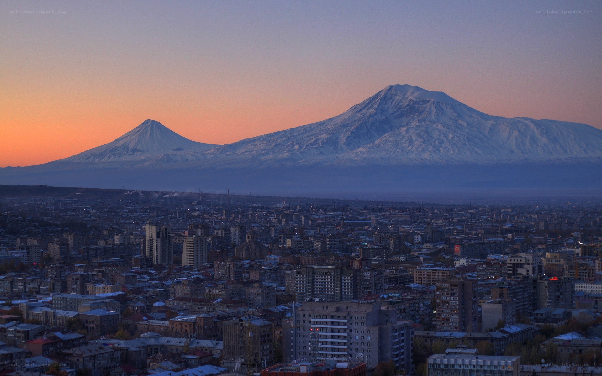 Yerevan cityscape with volcanoes