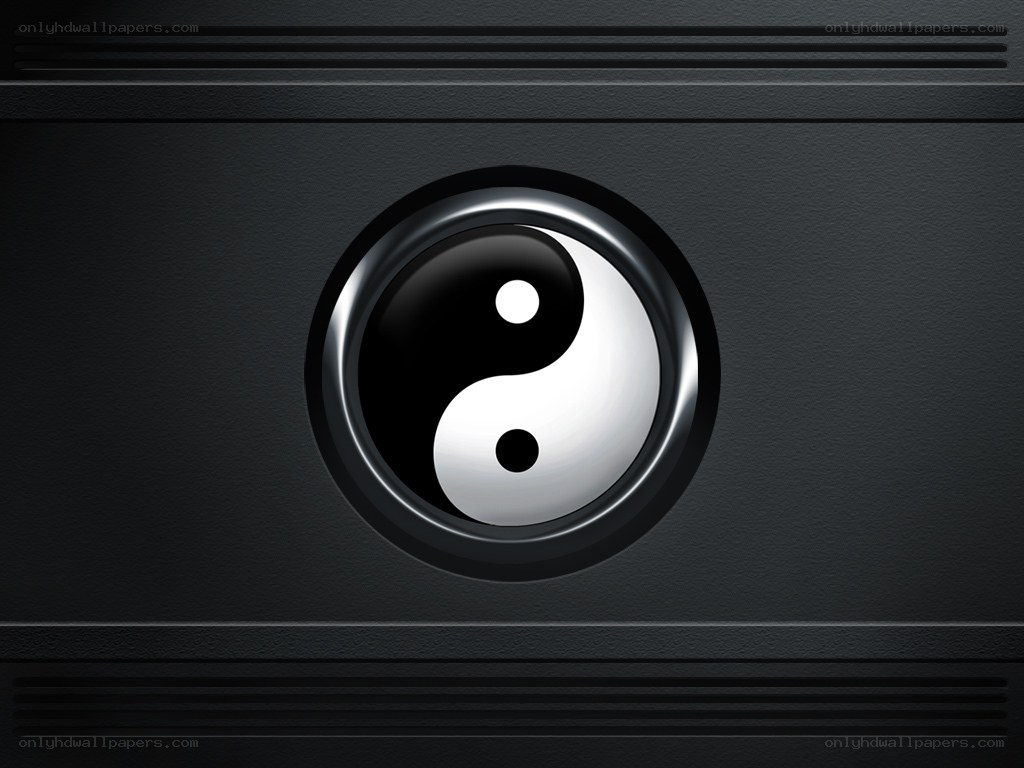yin-yang symbol on black surface