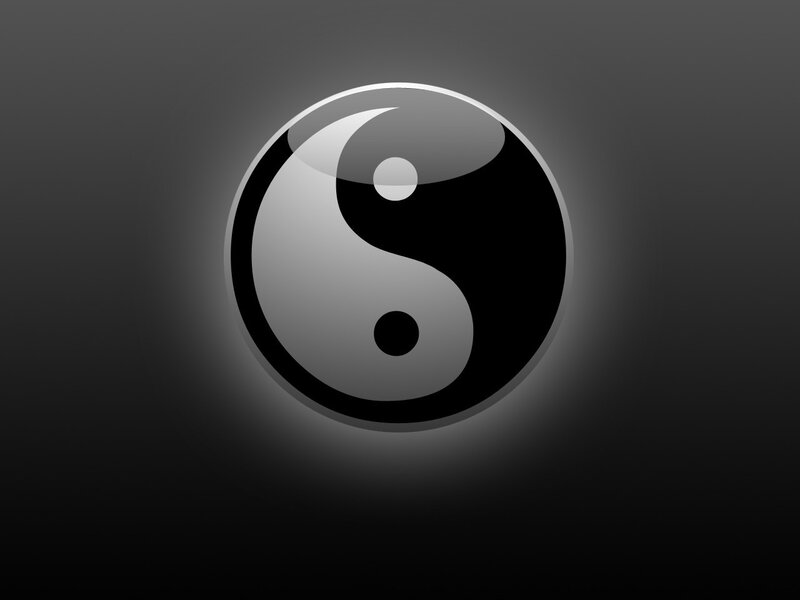 yin-yang symbol on dark background