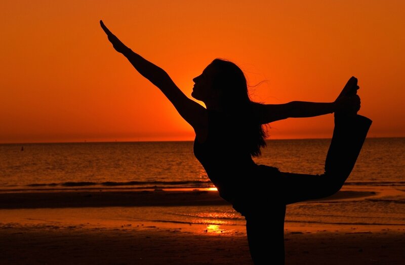 Yoga at sunset on the beach
