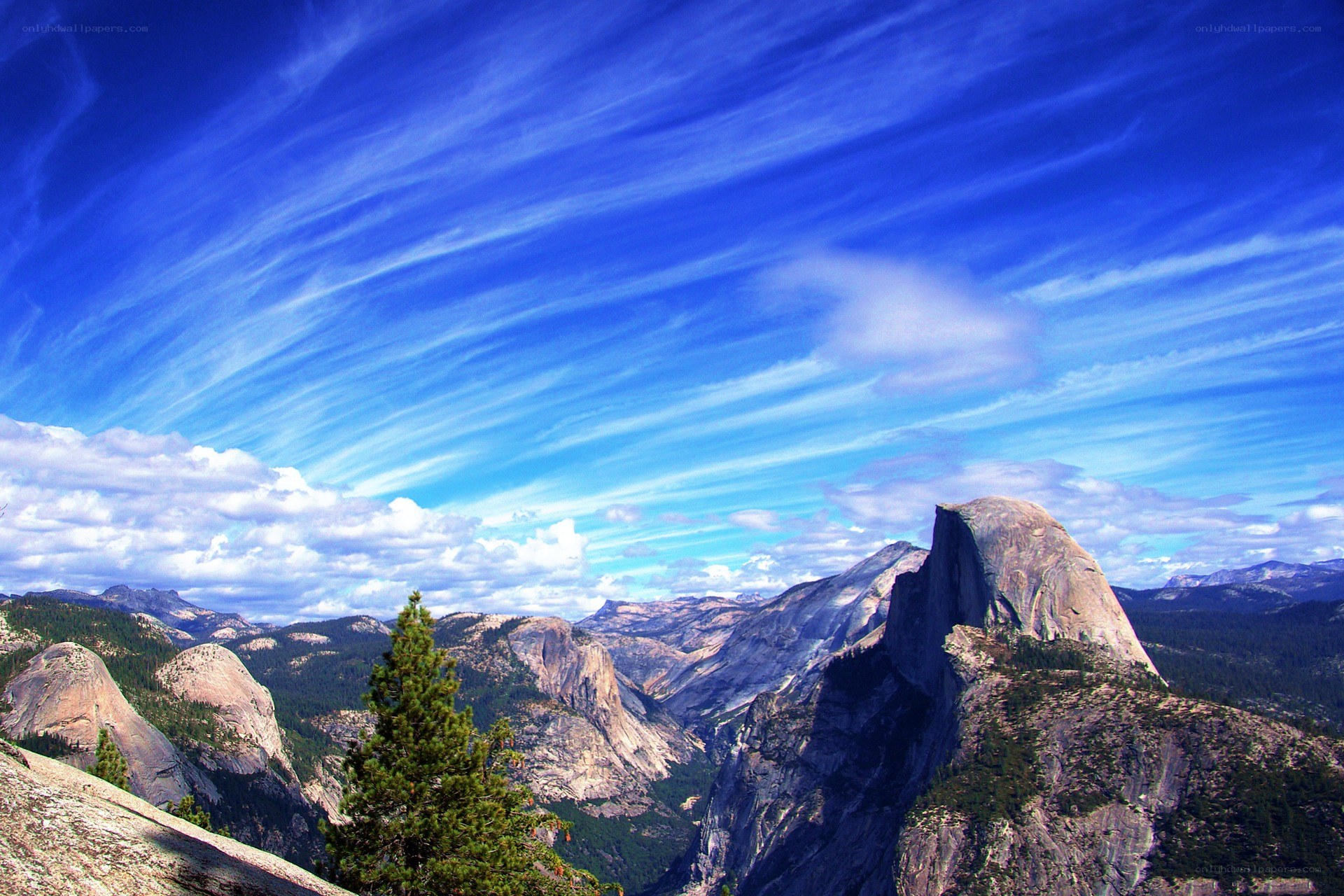 Yosemite's Half Dome under blue sky