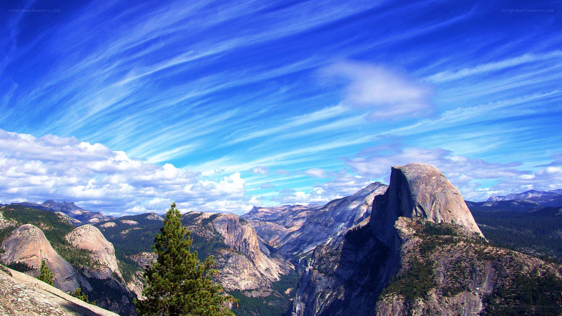 Yosemite's Half Dome under blue sky