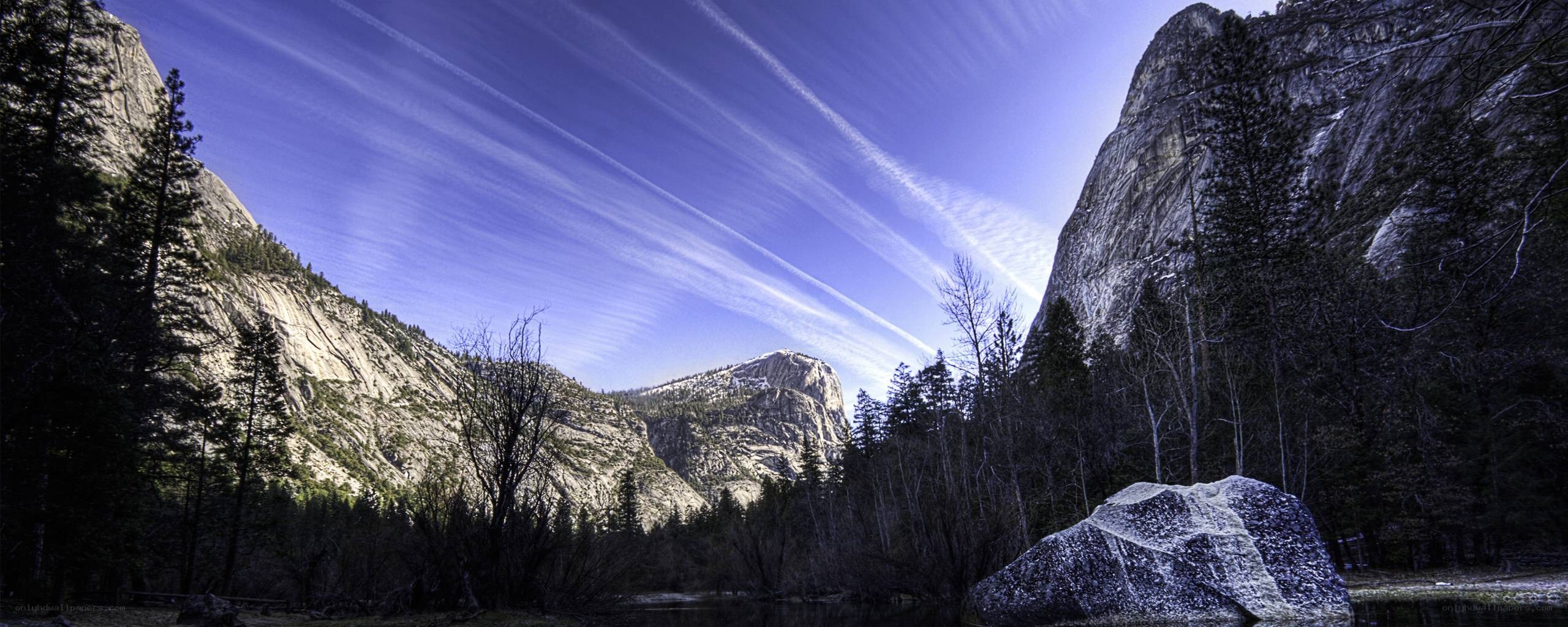 Yosemite valley with contrails
