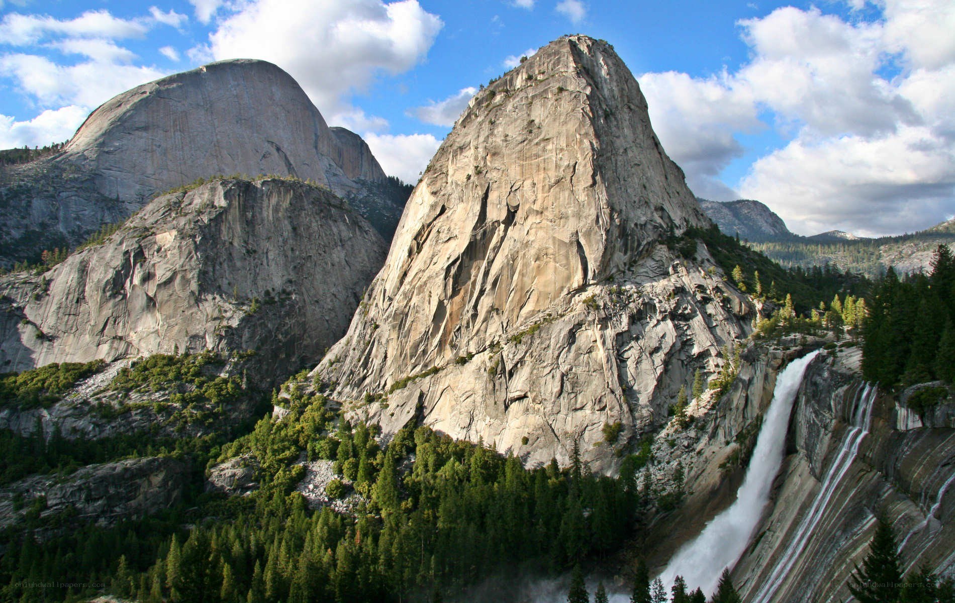 Yosemite waterfall and granite cliffs