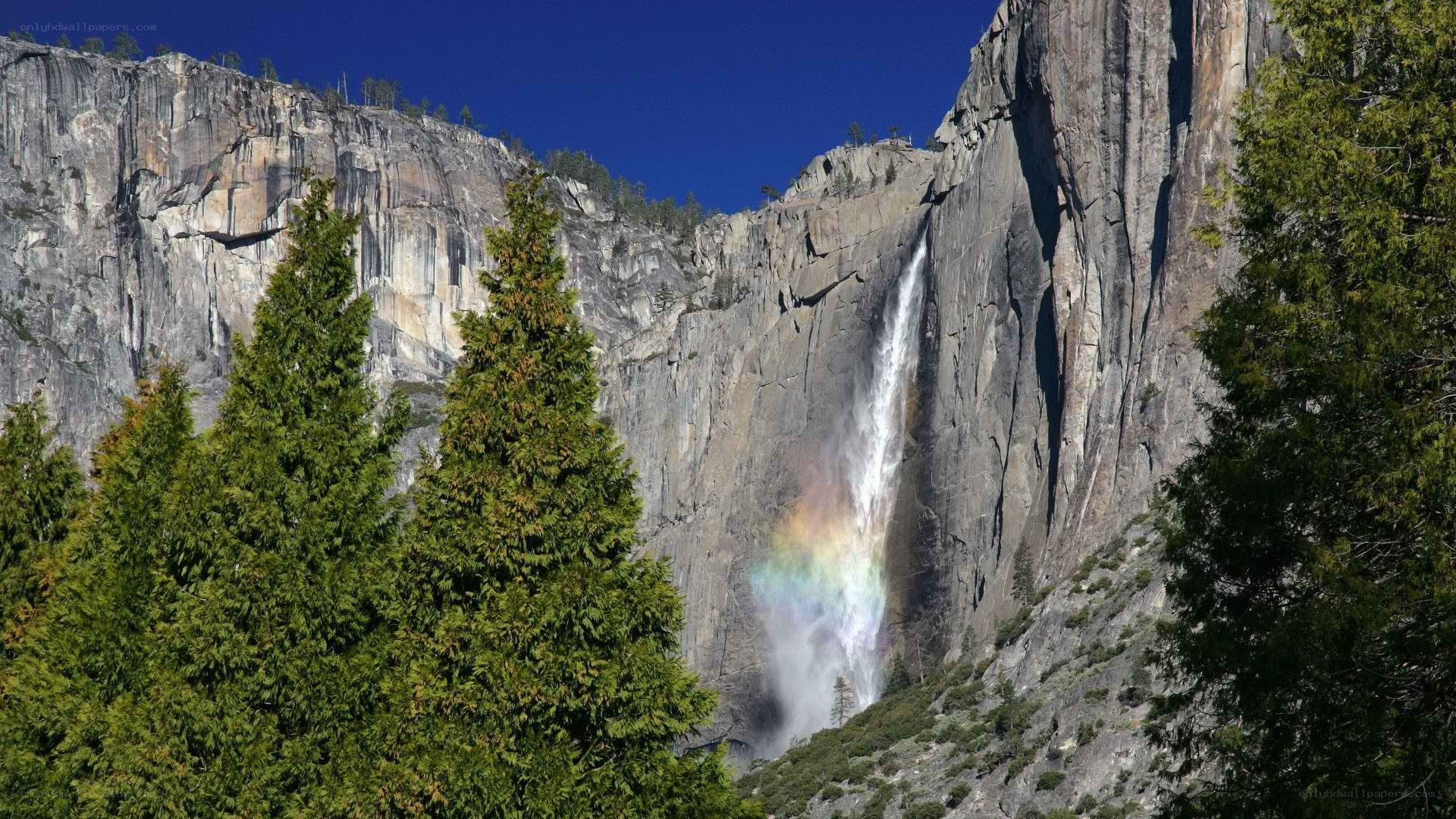 Yosemite waterfall with rainbow