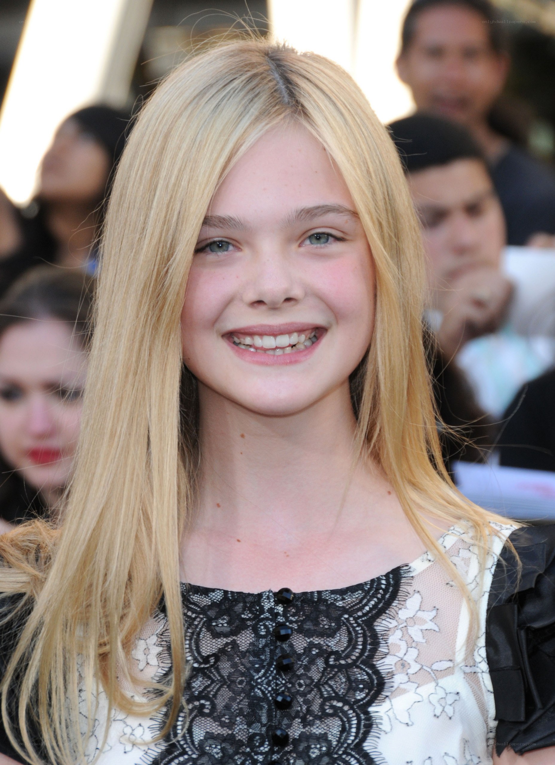 Young actress smiling at event