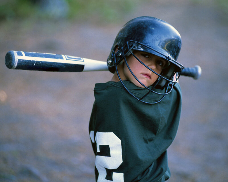 young baseball player at bat