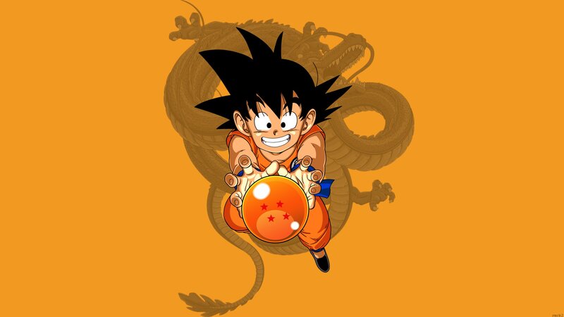Young Boy Holding a Ball — Orange