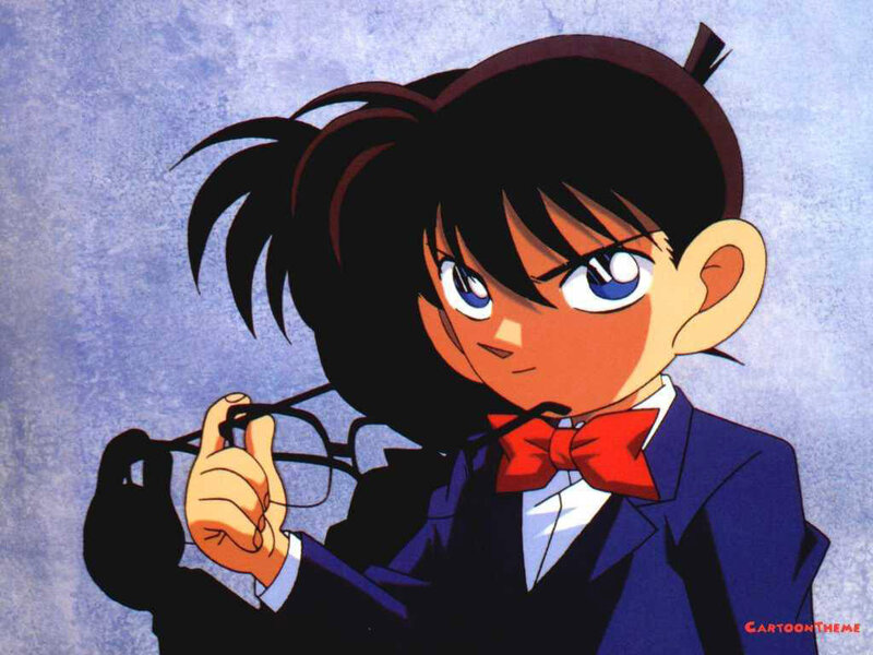 Young Boy Holding Glasses