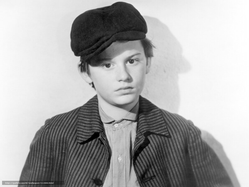 young boy in cap and jacket