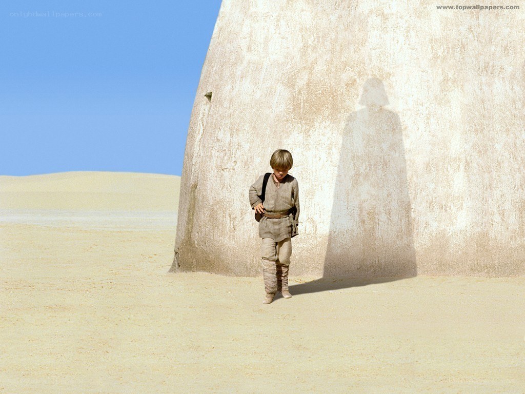 young boy in desert landscape