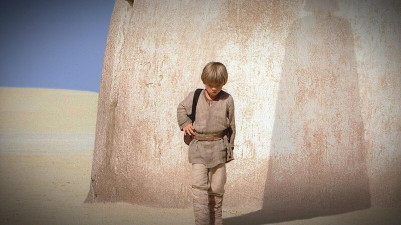 young boy in desert landscape