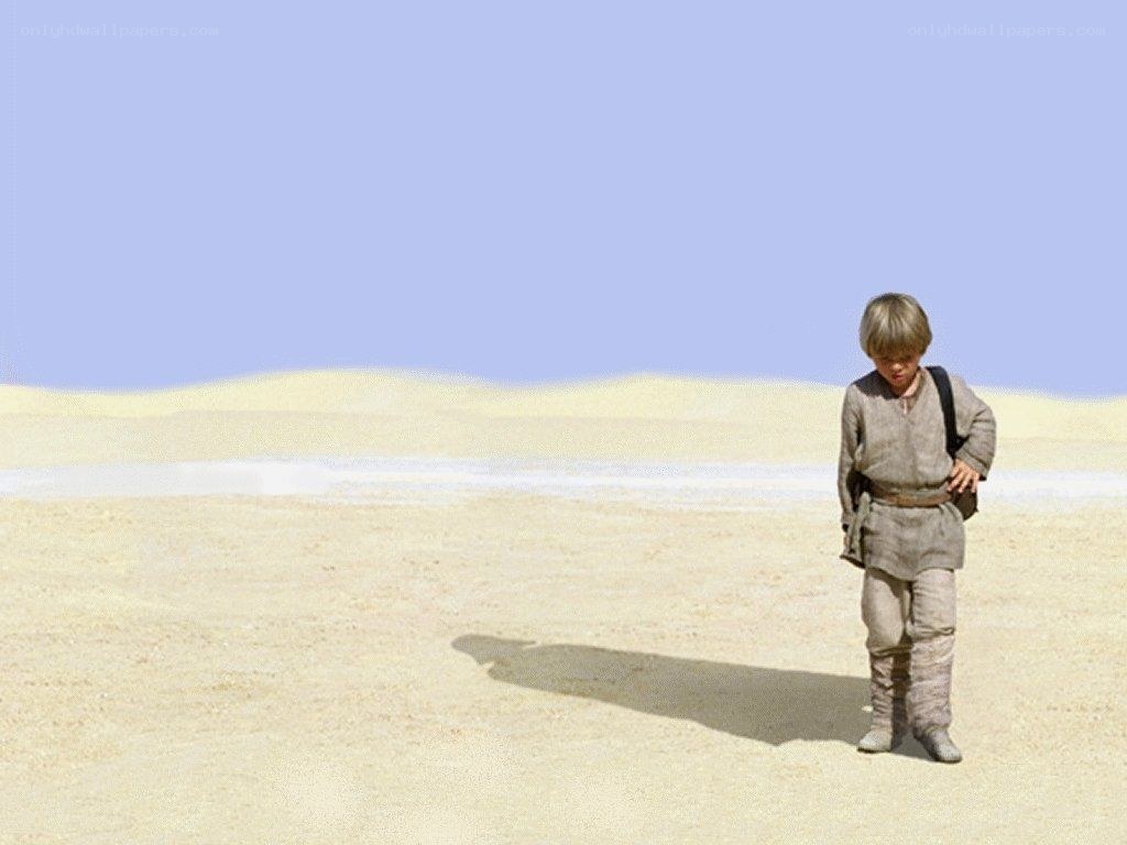 young boy in desert landscape
