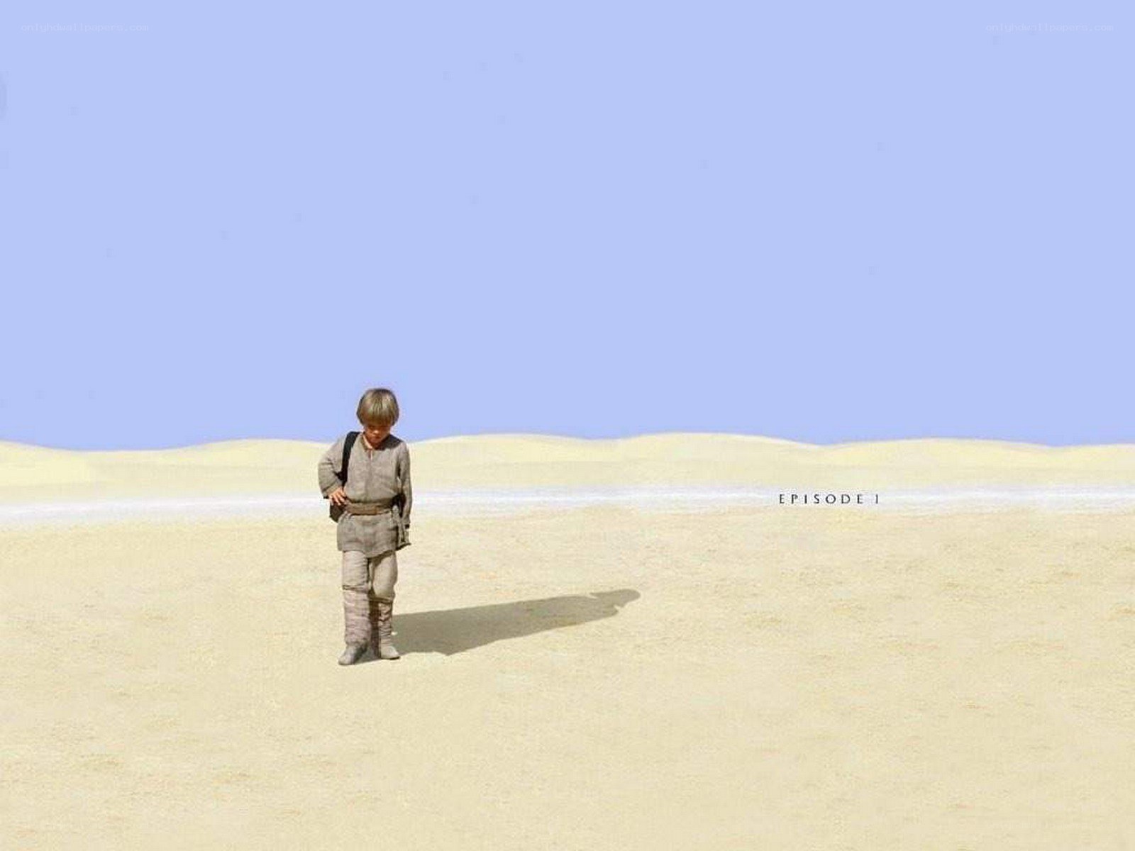 Young boy in desert landscape