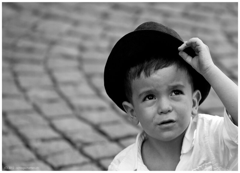 Young Boy in Hat — Black