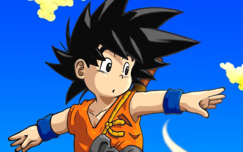 Young Boy in Orange Shirt