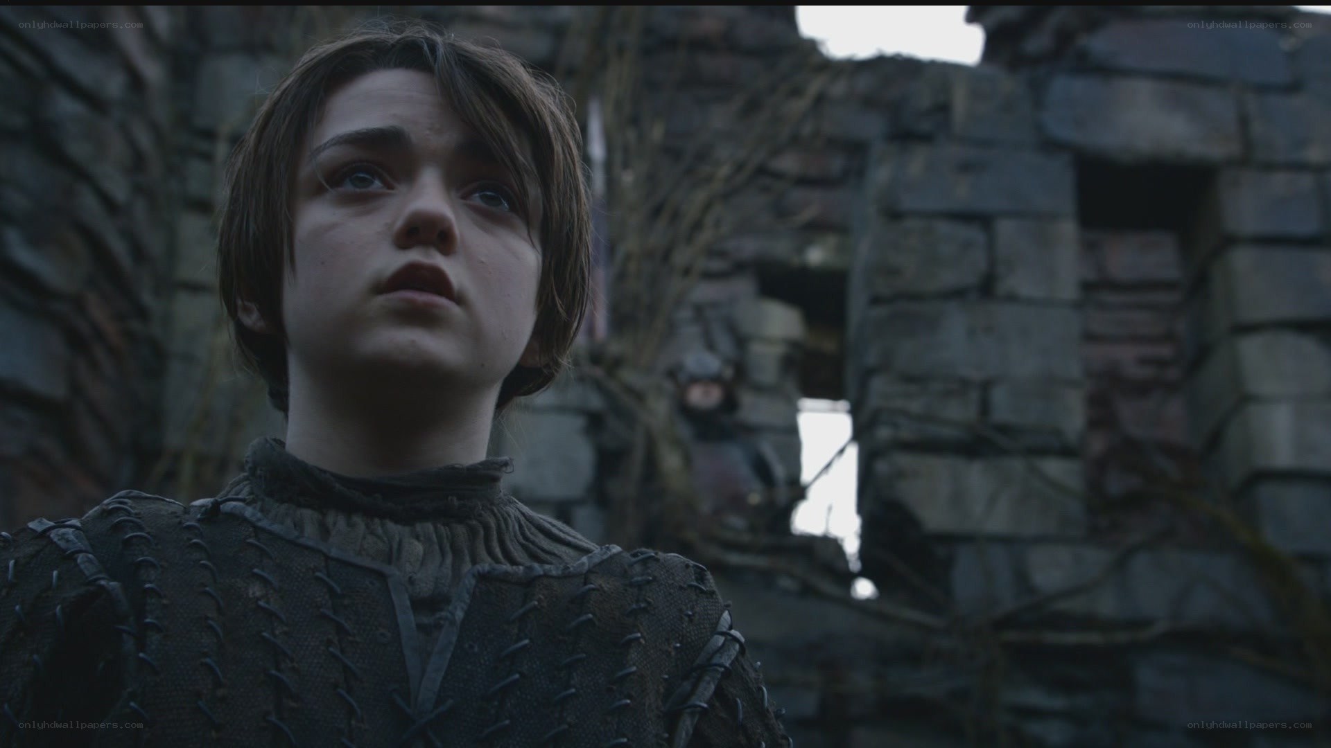 young boy in ruined castle