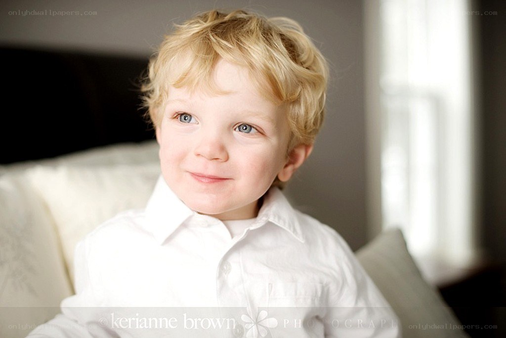 young boy in white shirt