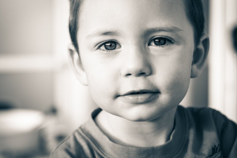 Young Boy Looking at Camera
