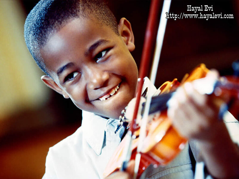 Young Boy Playing Violin