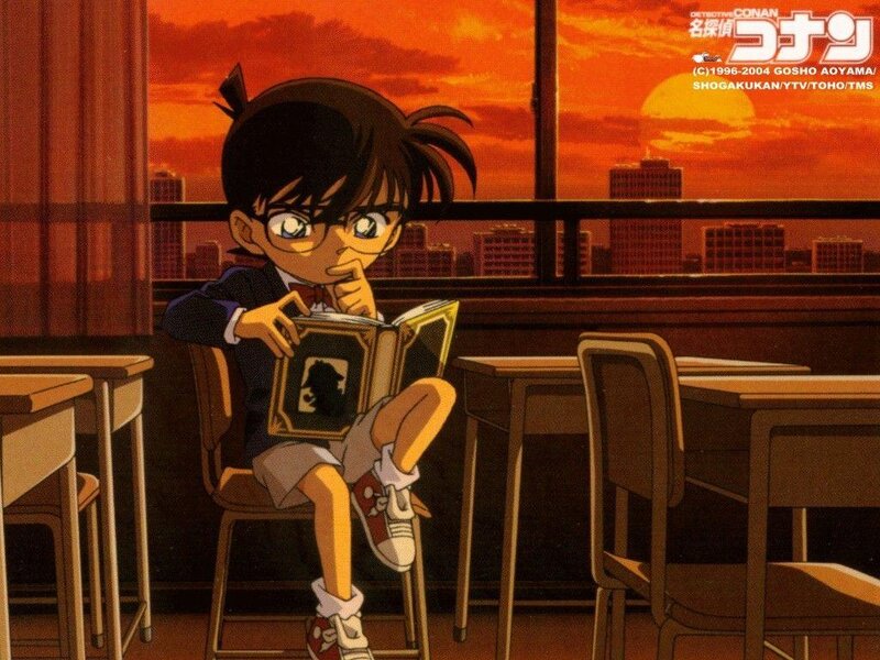 Young Boy Reading Book — Orange