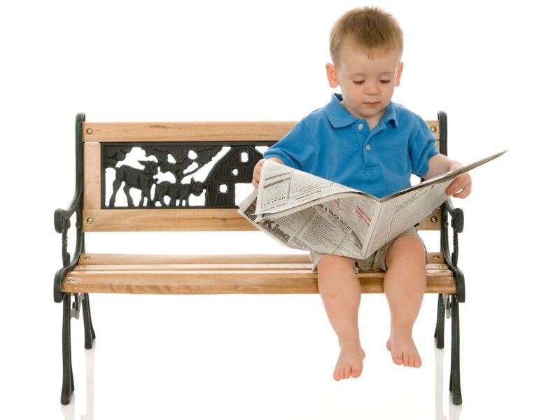 Young Boy Reading Newspaper — Blue, Calm