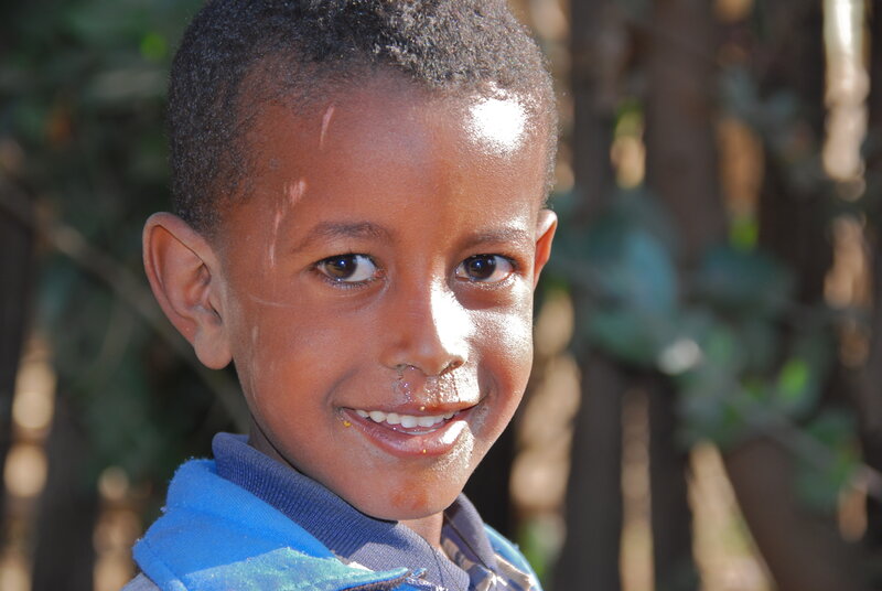 Young Boy Smiling — Blue